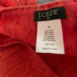 Orange JCrew cable knit sweater